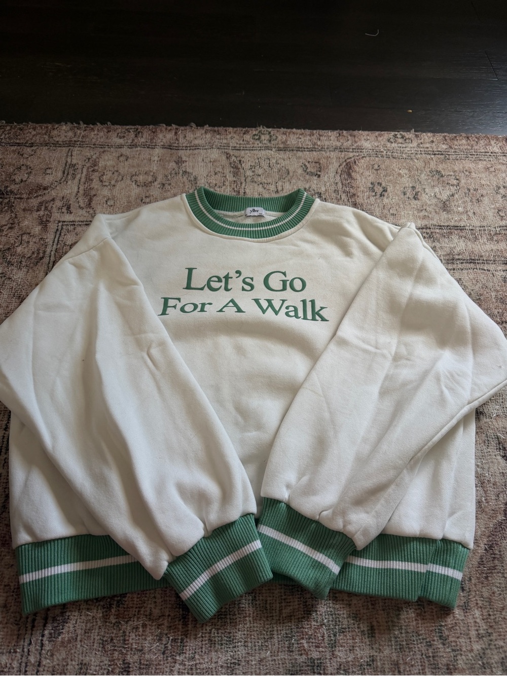 Cream Crewneck Sweater with Green Trim and Chest Text